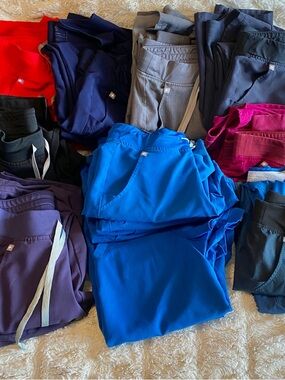 HUGE LOT WOMENS FIGS SCRUB SETS 
Jackets..leggings